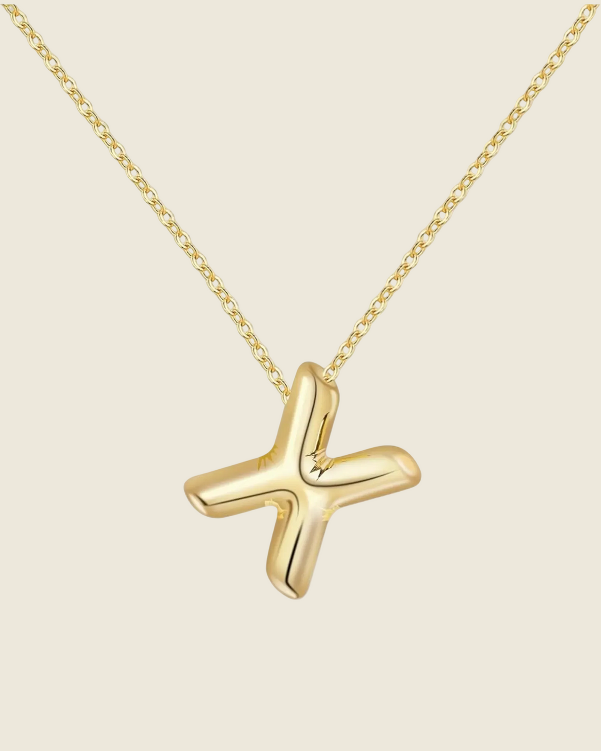 Collier doré à chaîne fine avec pendentif lettre X bombé