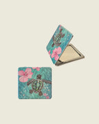 Miroir de poche ouvert et fermé, avec motif tortue marine et fleurs roses sur fond turquoise