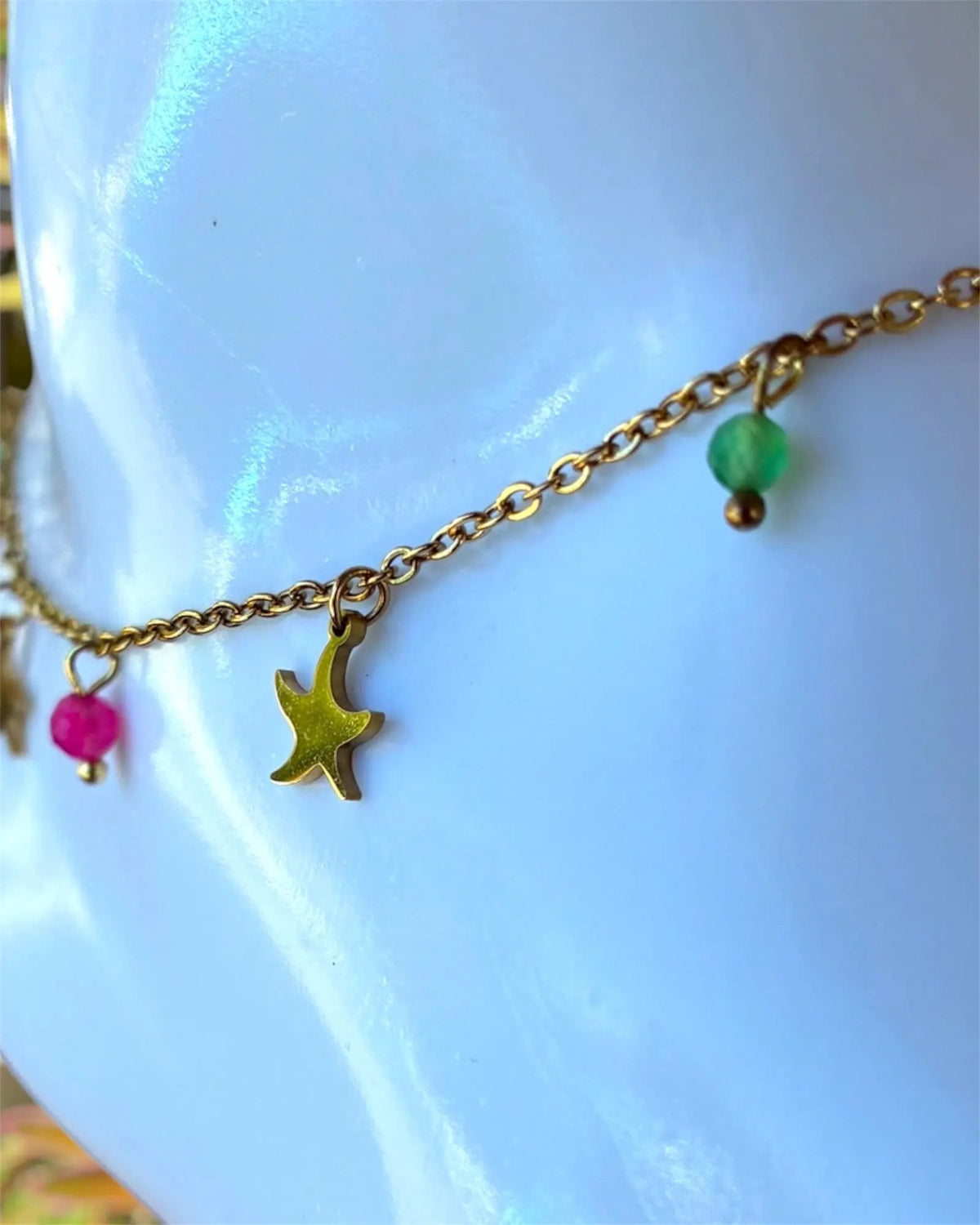 Chaîne de cheville dorée • étoiles de mer & perles colorées