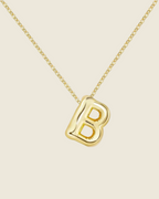 Collier lettre • acier inoxydable doré