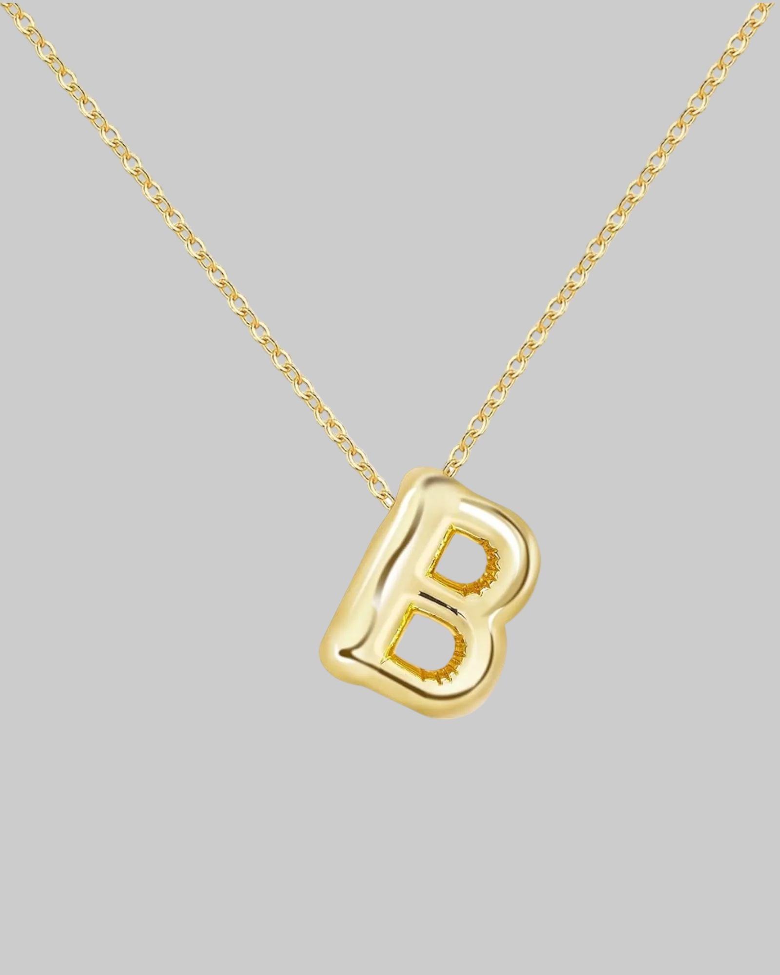 Collier lettre en acier inoxydable doré