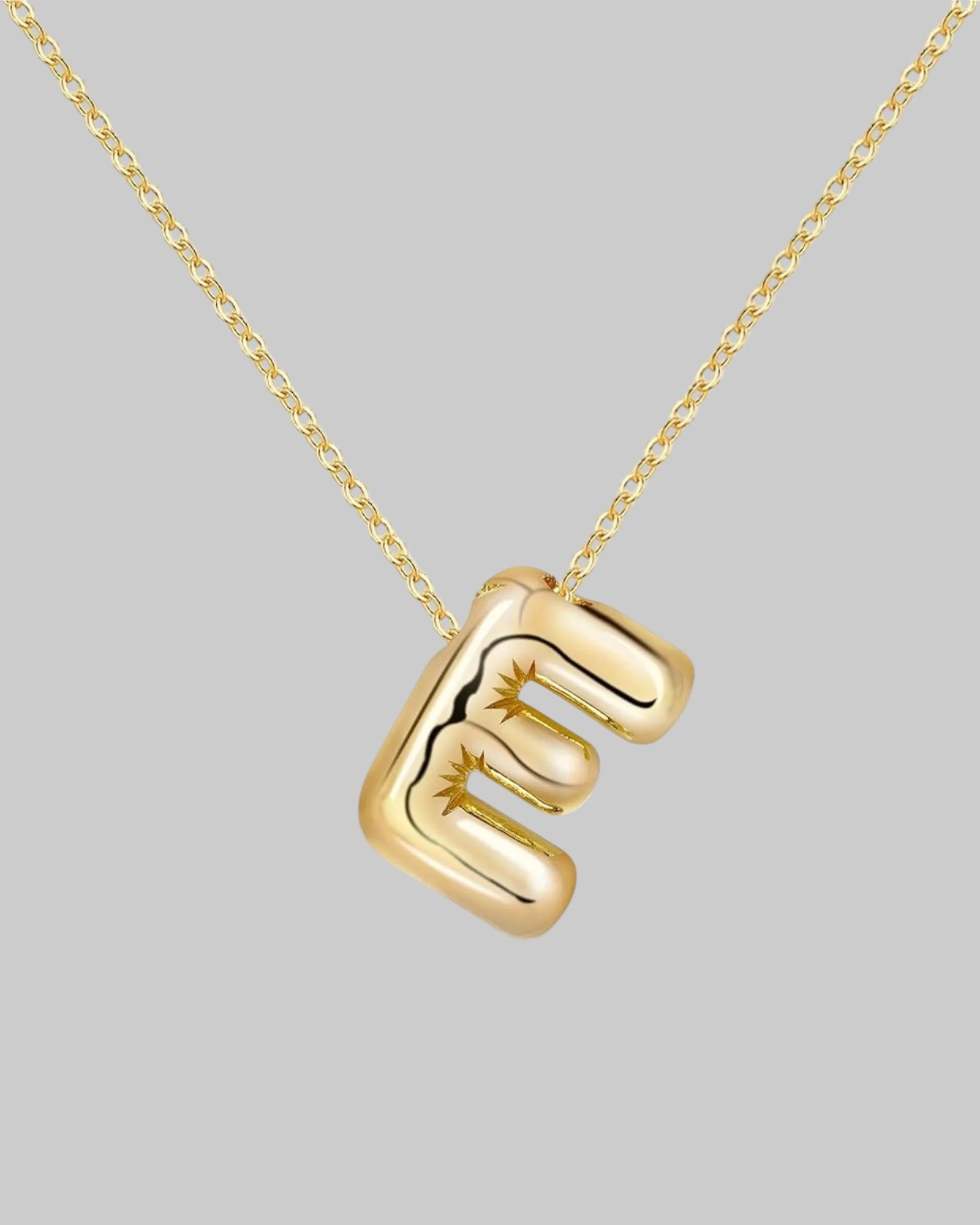 Collier lettre en acier inoxydable doré