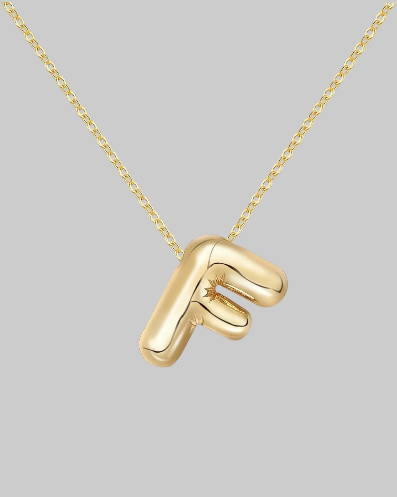 Collier lettre en acier inoxydable doré