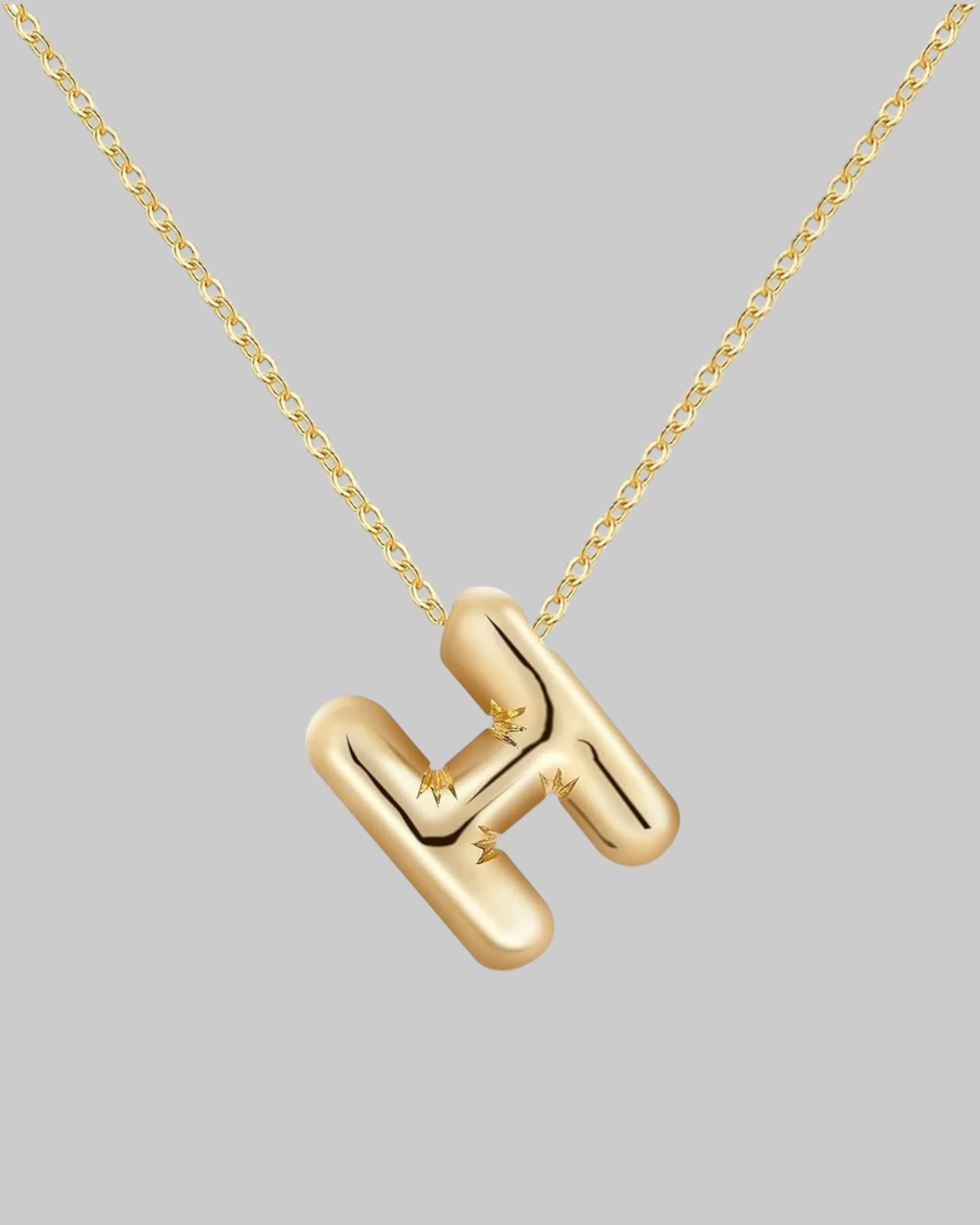Collier lettre en acier inoxydable doré