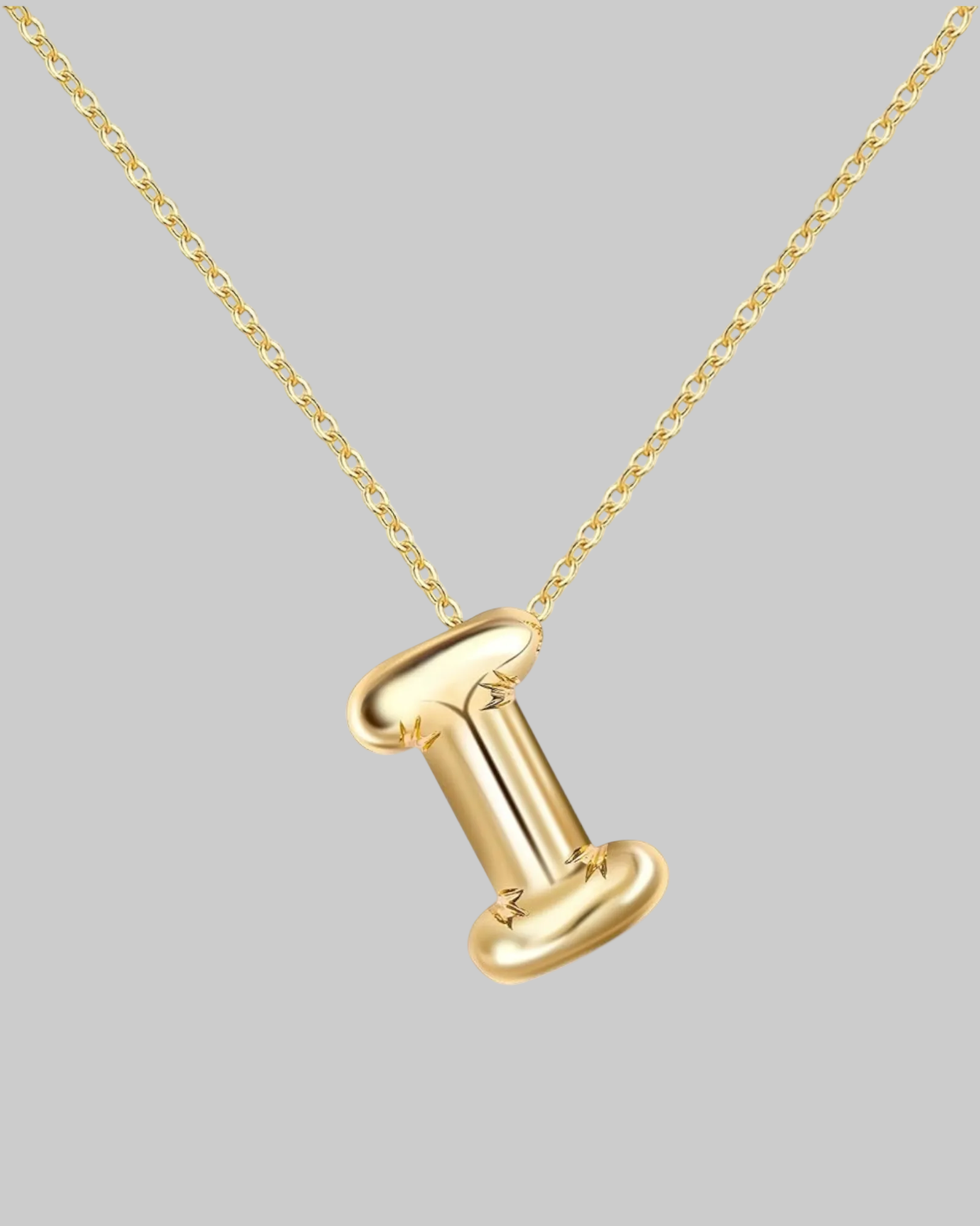 Collier lettre en acier inoxydable doré