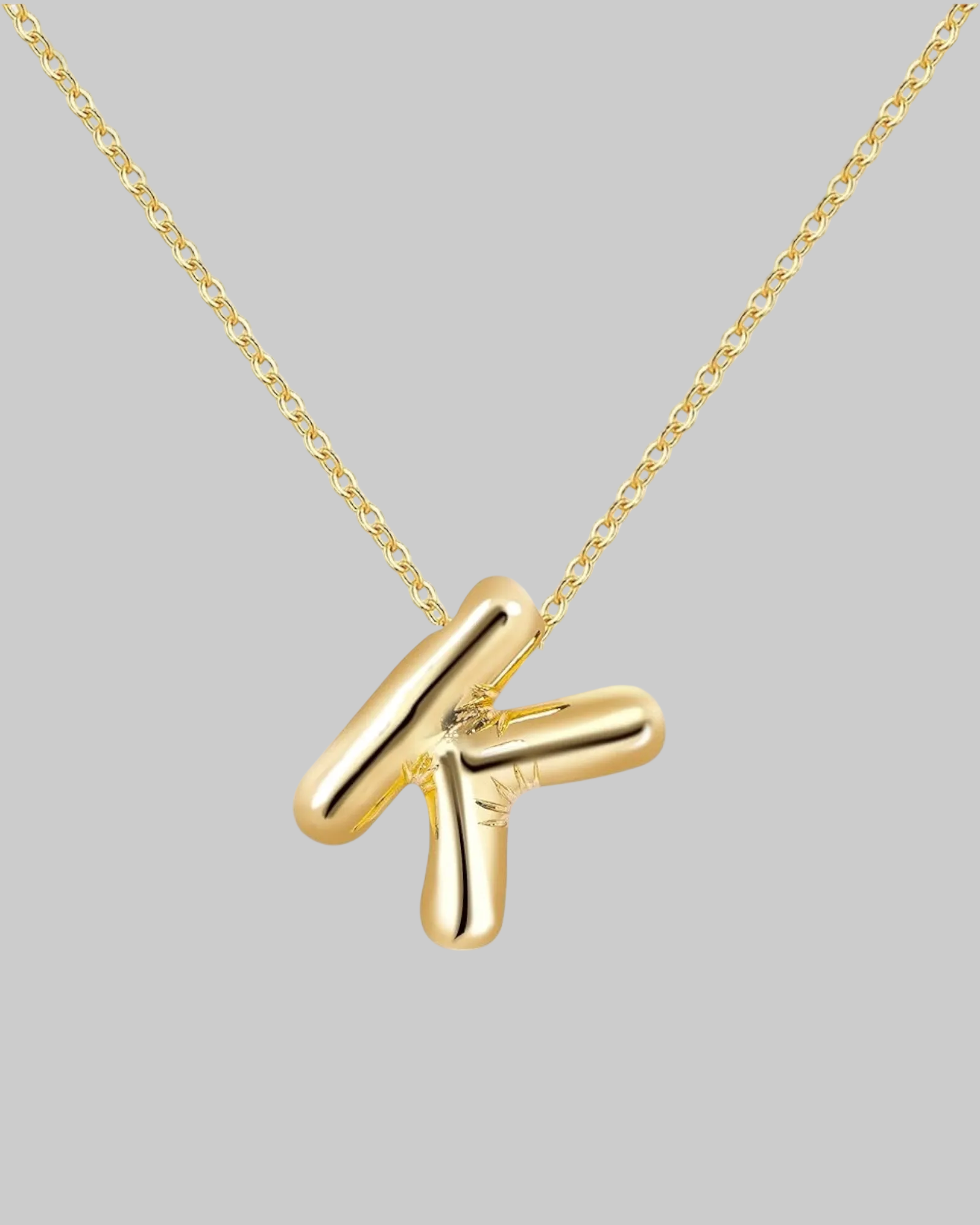 Collier lettre en acier inoxydable doré