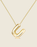 Collier lettre • acier inoxydable doré