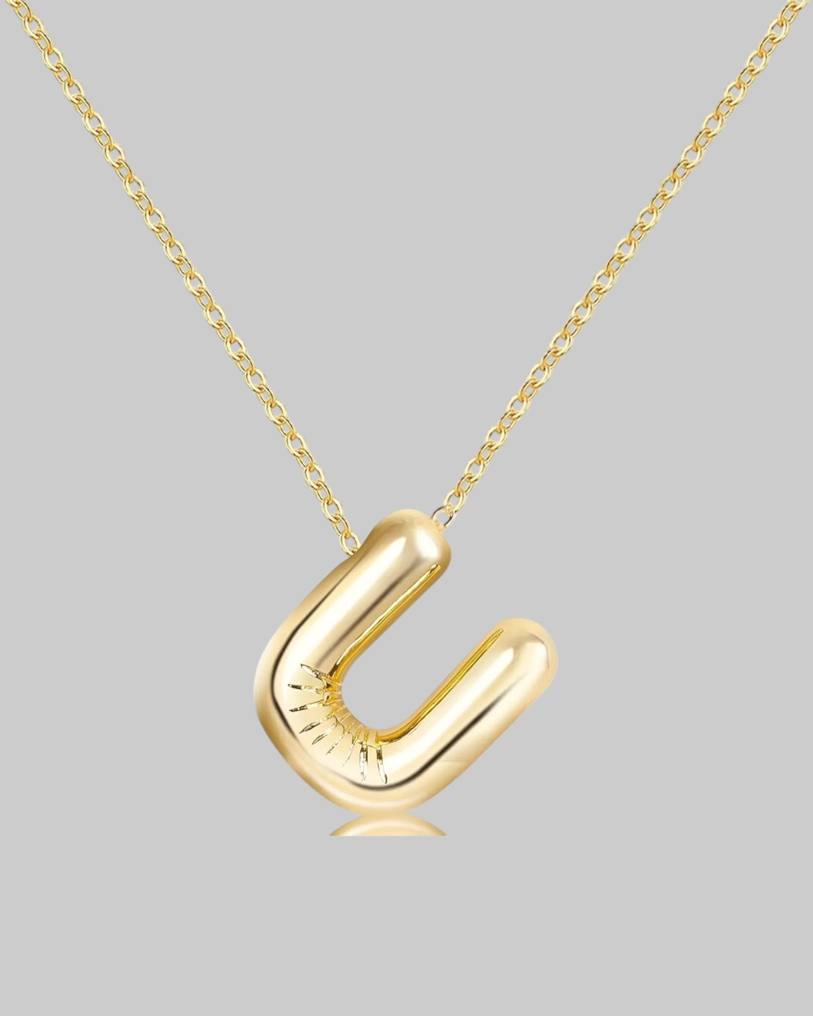 Collier lettre en acier inoxydable doré
