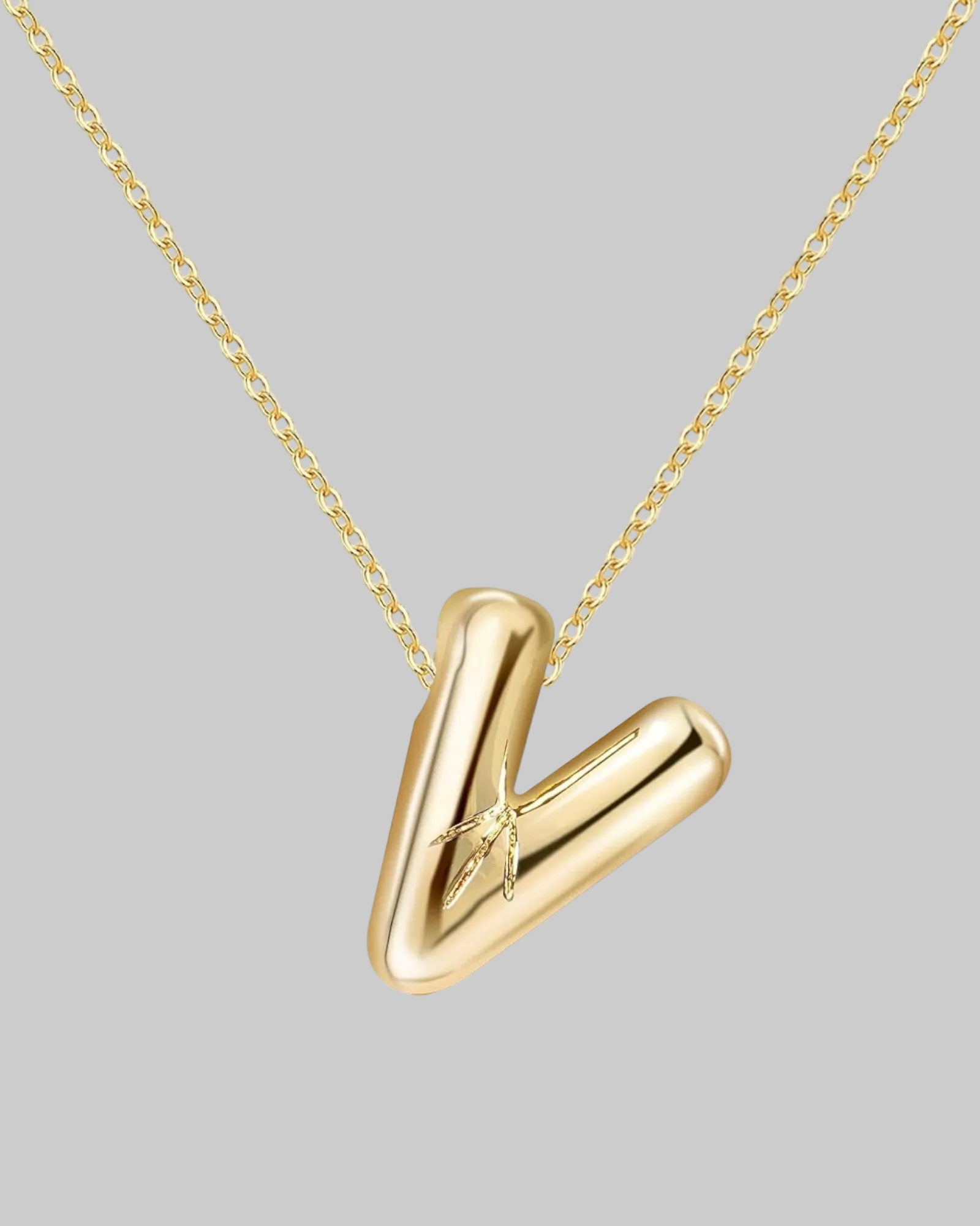 Collier lettre en acier inoxydable doré