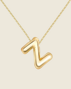 Collier lettre • acier inoxydable doré
