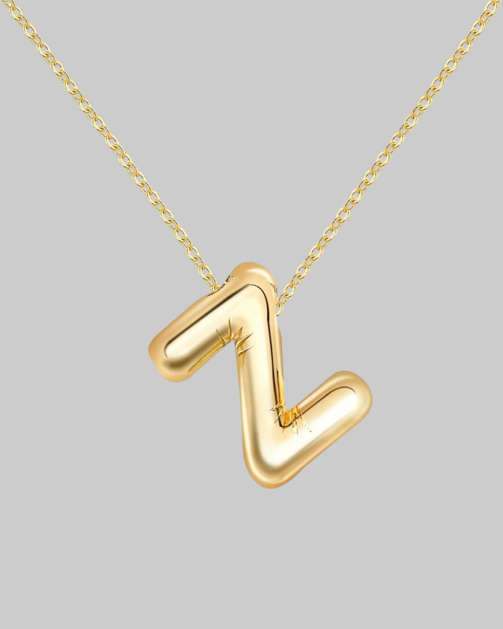 Collier lettre en acier inoxydable doré