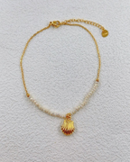 Chaîne de cheville en acier inoxydable doré avec perles et pendentifs coquillage