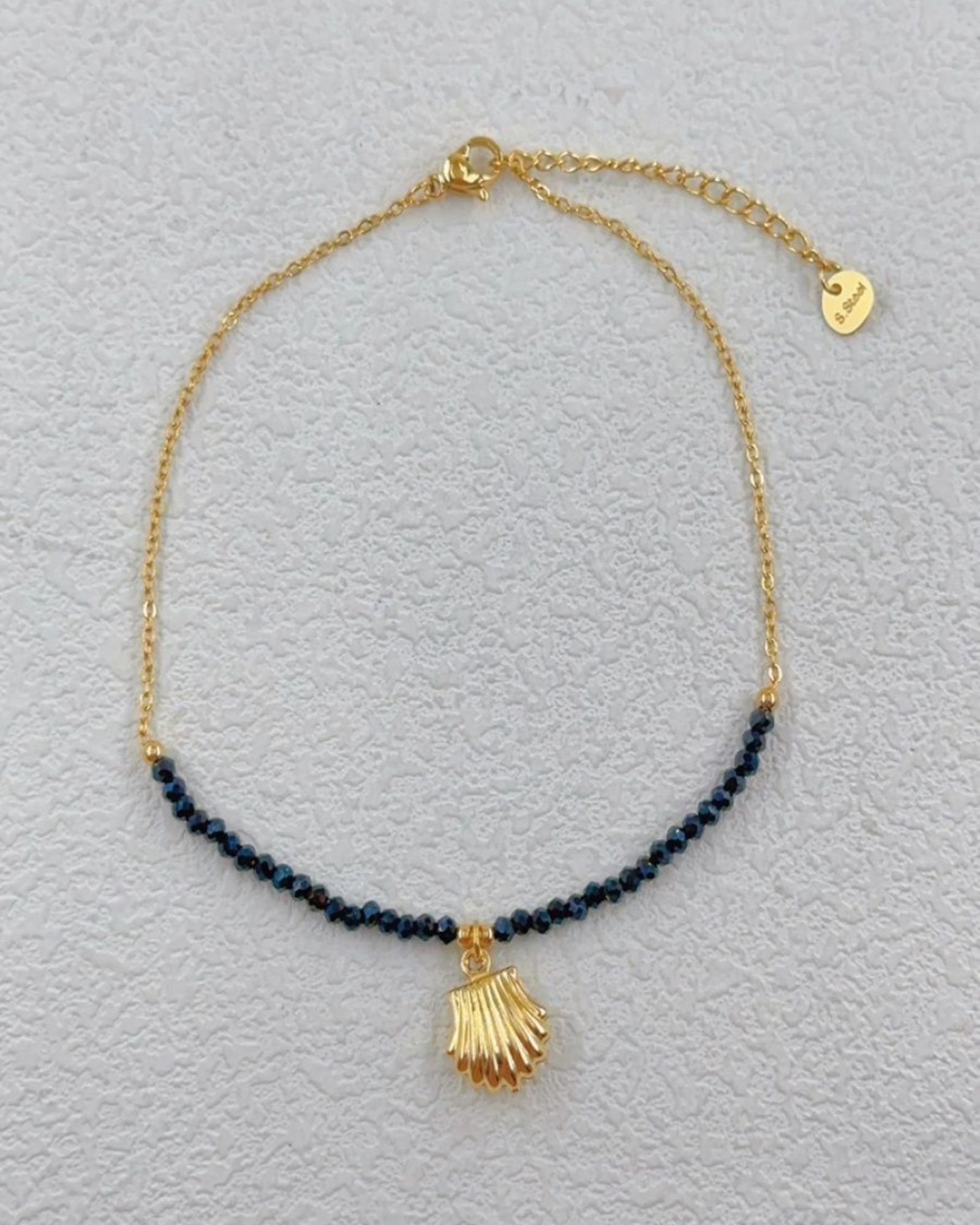 Chaîne de cheville en acier inoxydable doré avec perles et pendentifs coquillage