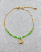 Chaîne de cheville en acier inoxydable doré avec perles et pendentifs coquillage
