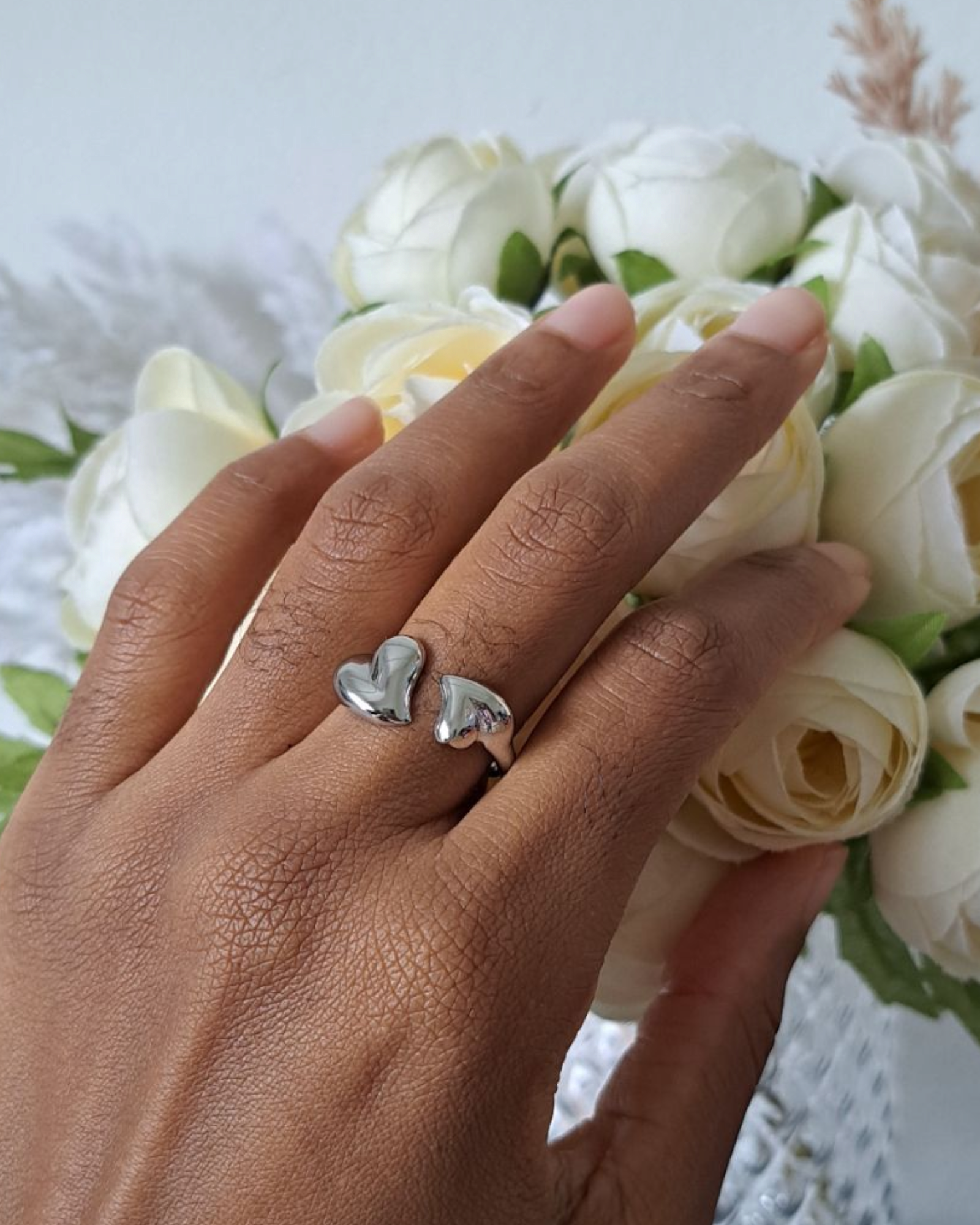 Bague ouverte duo de cœurs en acier inoxydable argenté